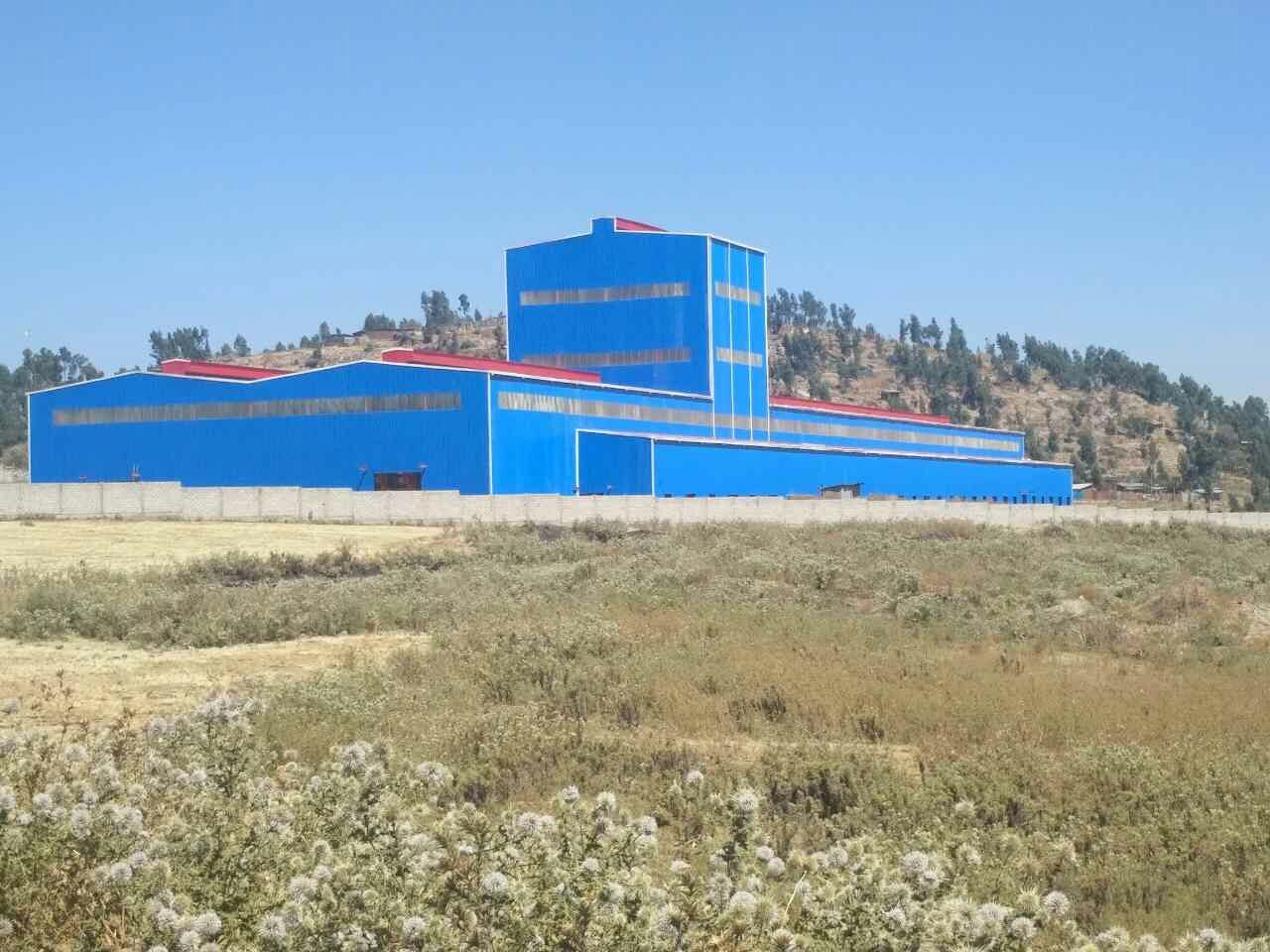 one- layer blue Commercial steel building with apartment